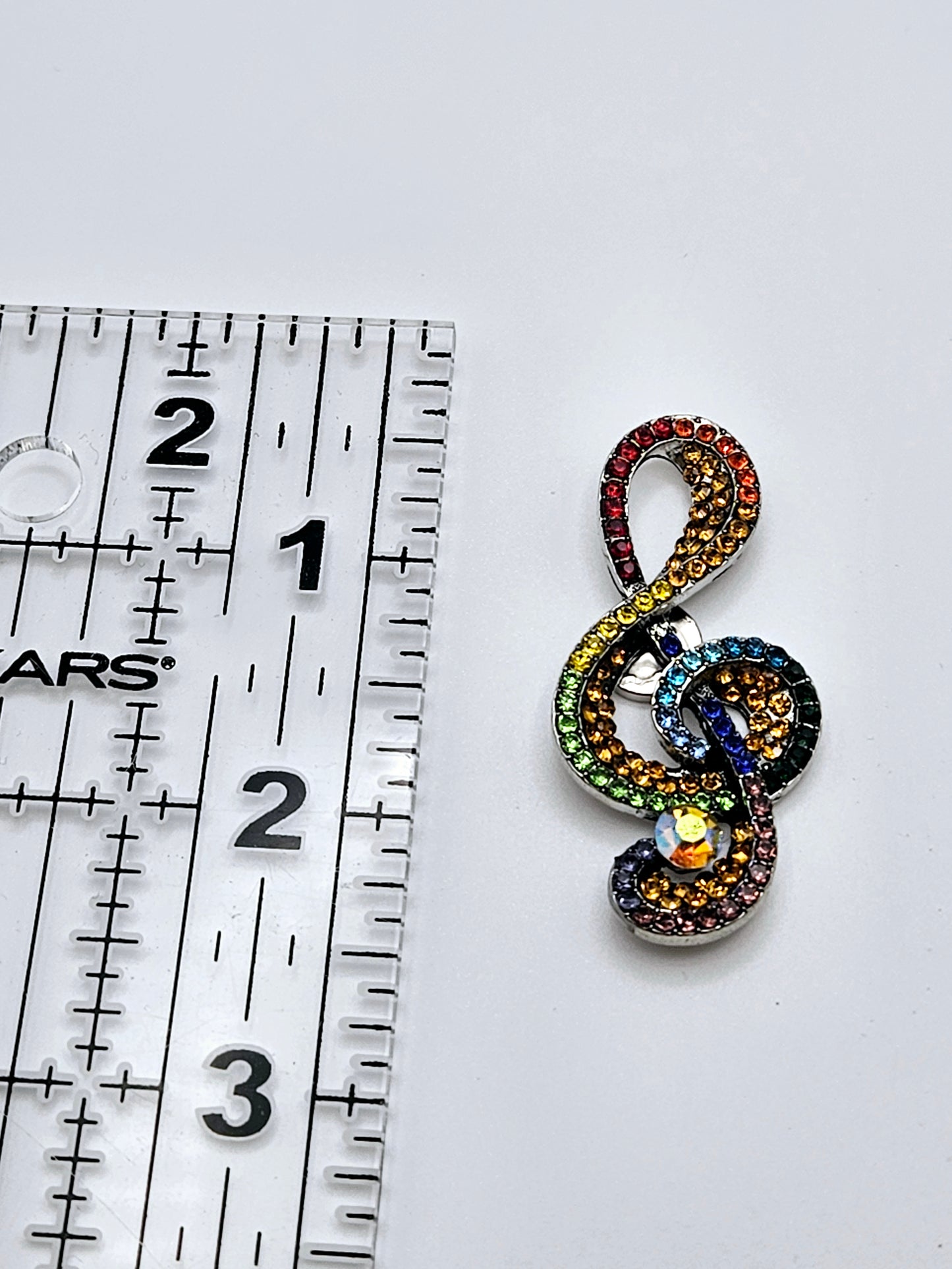 Rainbow Bling Treble Clef Coverminder